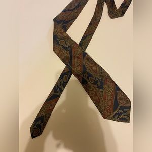 Jsaco blue and maroon men’s tie. This tie is made in Italy.